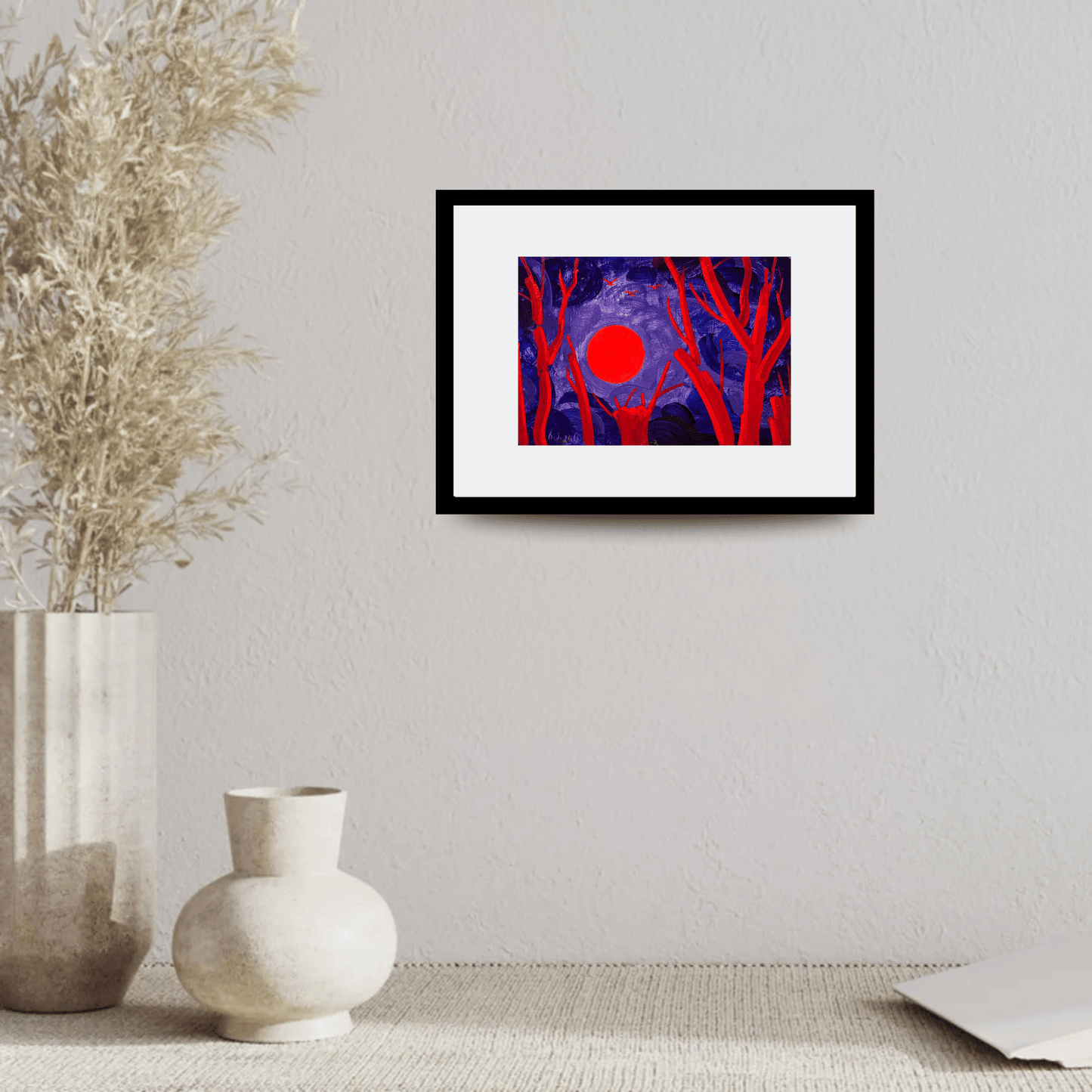 მზის ჩასვლა აწითლებულ ხეებთან